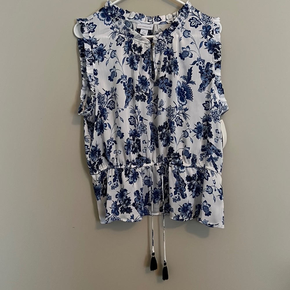 Sleeveless flowered shirt